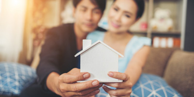 Young Couple with Home Insurance